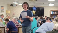 The Chase star hosts charity quiz night at Iffley care home