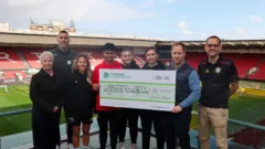 Persimmon Charitable Foundation opens funding round with three £50k grants for youth employability charities. Image: Previous donation to Bristol City FC Robins Foundation