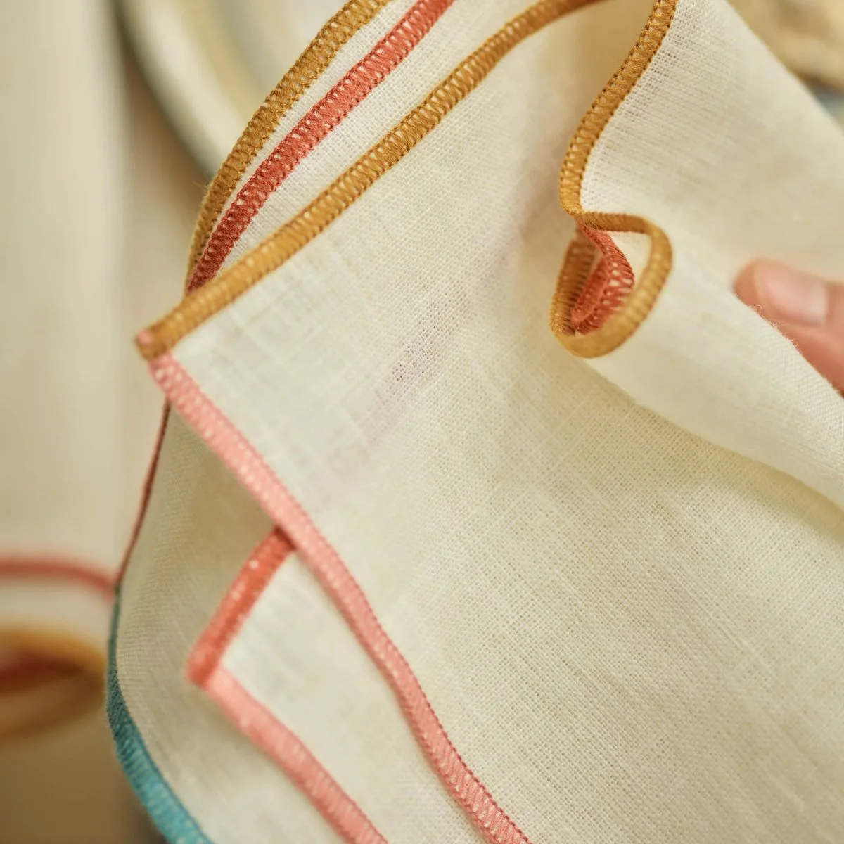 Contrast Trim Linen Napkin
Rowen & Wren
Classic white linen napkin finished with a subtle coloured trim for understated seasonal detail.