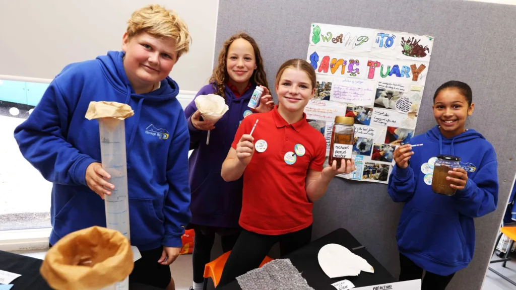 The team from North Leigh CE Primary showcase their scientific investigation into water filters